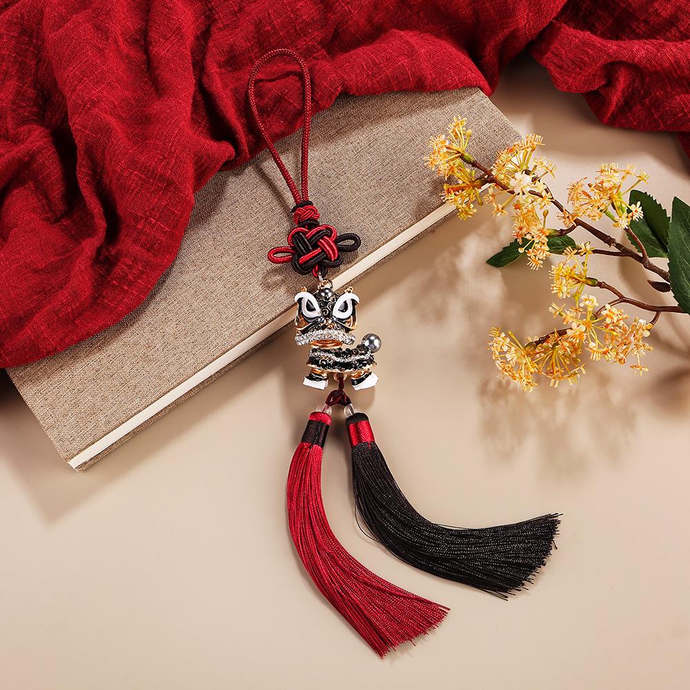 The Cultural Heritage of Lion Dancing, The Lion-dancing Car Ornament, The Lucky Cat Gift, and The Auspicious Lion.