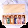 Agarwood Travel Bottle Set: Creative Gift with Wooden Box, Aluminum Lid & Wood Stopper.