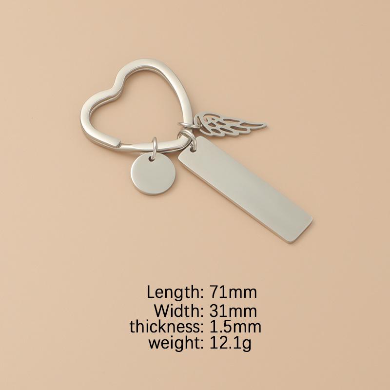 Брелок-подвеска Love Ring из нержавеющей стали с крылом и выгравированным номером.