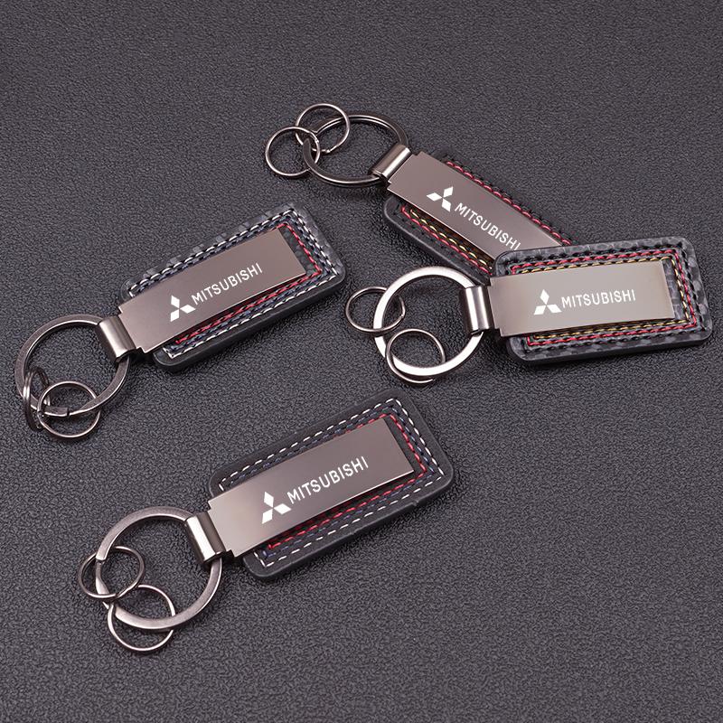Carbon Fiber Leather Car Logo Keychain Key Ring Pendant For Mitsubishi Lancer Ralliart ASX Mirage Pajero Xpander Attrage L200