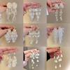 Luxury French Pearl Flower Tassel Earrings for Women - Elegant Retro Petal Design