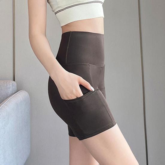 Женские защитные шорты с боковыми карманами, однотонные, высокоэластичные, летние шорты, впитывающие пот, с функцией подъема бедер
