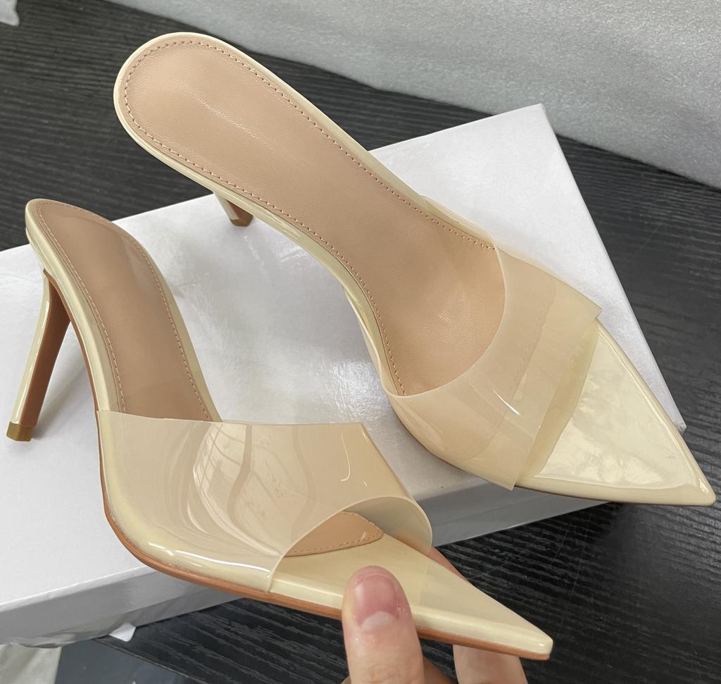 The new simple nude transparent high-heeled slippers with thin heels and pointed toes are not tired, and the high-heeled sandals are worn with open