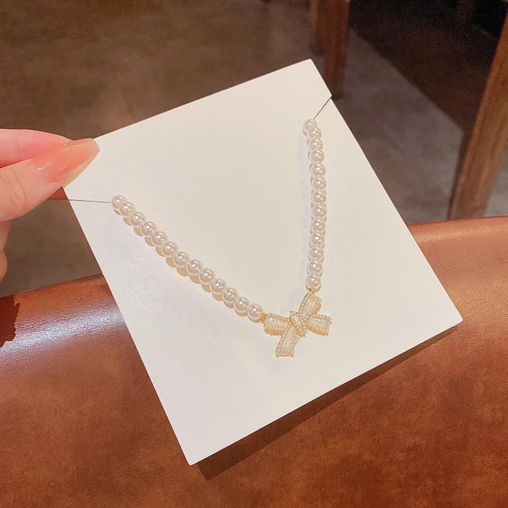 Elegant Adjustable Pearl Necklace Bowknot Pendant Necklace Fashion Neck Jewelry Present for Stylish Women Fashion Lover