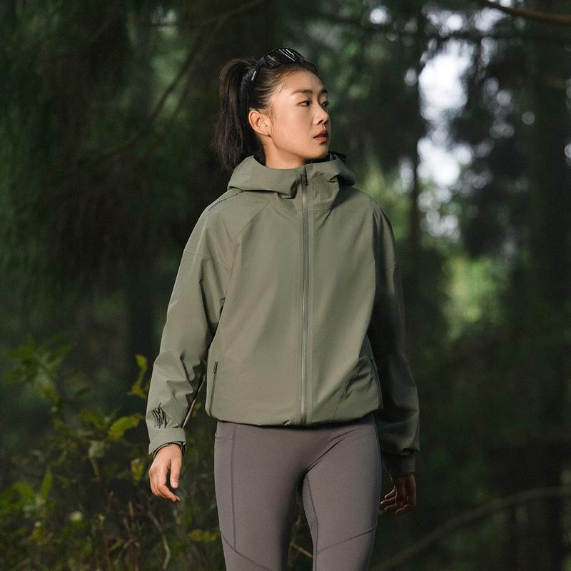 Li Ning CF Su Wan Long Jia Protection Series Outdoor однотонная свободная ветровка на молнии с капюшоном унисекс верхняя одежда чайно-зеленого цвета AEMV005-6