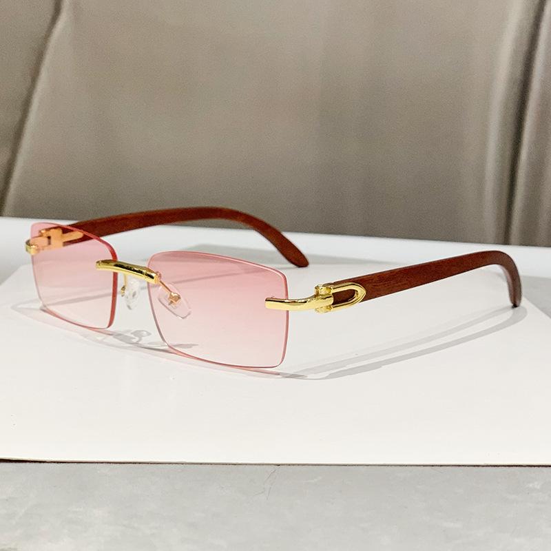 New frameless trimmed personalized sunscreen sunglasses catwalk travel fashion versatile wood grain legs advanced sunglasses