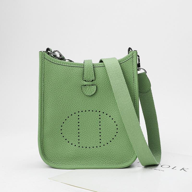 Фабричная оптовая продажа сумка-ведро из натуральной коровьей кожи первого слоя женская сумка с узором личи полый дизайн на одно плечо через плечо полый дизайн