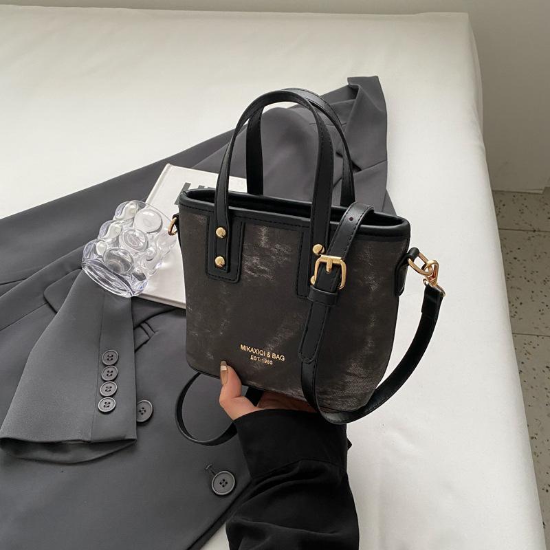 Нишевая высококлассная маленькая сумка женская 2025 новая модная и универсальная на плечо, сумка-мессенджер, модная супер-огненная портативная сумка-ведро