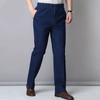Весенние джинсы-стрейч, мужские повседневные универсальные джинсовые брюки, рабочие брюки среднего возраста, большие размеры, свободные прямые джинсовые брюки