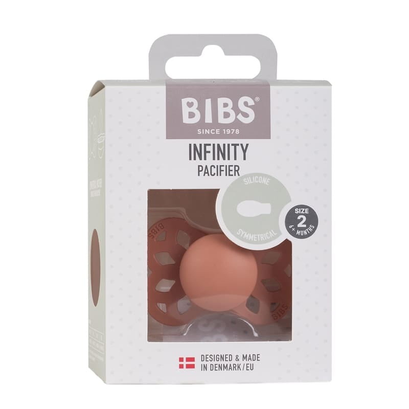 Smoczek Silikonowy Symetryczny Infinity M Peach 6M+, Bibs