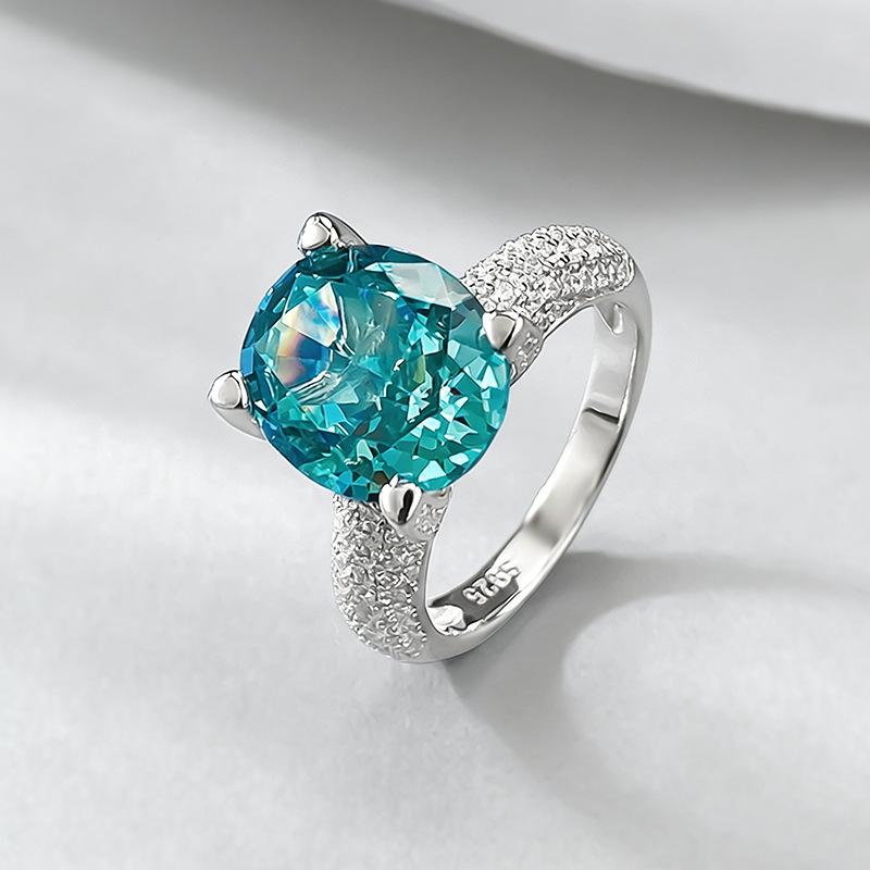 Xiancan Jewelry Серебряное кольцо S925 Овальное с огранкой 'Ледяной цветок' Paraiba с бриллиантом высокой твердости.