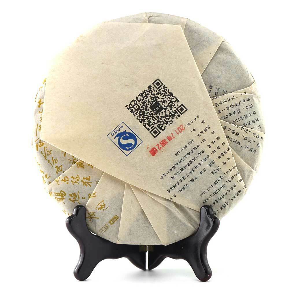 Высокое качество Ипинтан Мэнхай Сырой торт Пуэр Премиум 357г Шэн Пуэр Здравоохранение