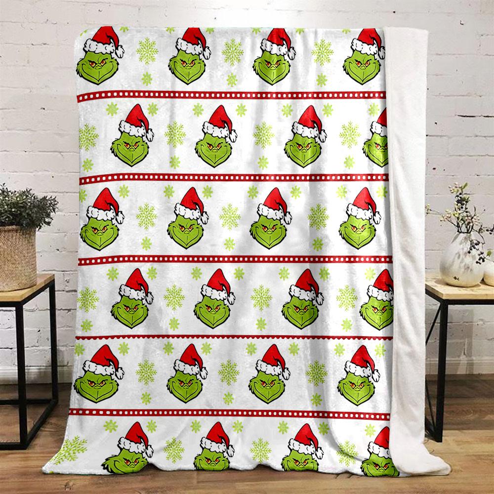 "Grinch Face with Santa Hats Pattern" Patterned flannel blanket perfect for the bedroom living room, sofa, or a little nap