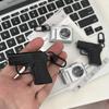 Quirky Personality Gun Toy & Luminous Keychain Camera