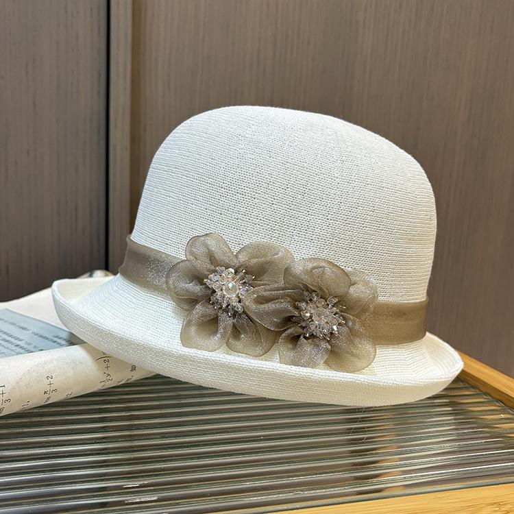Versatile curled top hat spring and summer new sunshade sunscreen knitted bucket hat foreign style shows washbasin hat tide