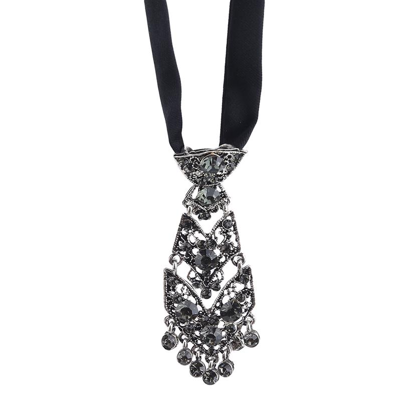 Small Tie with Colored Diamonds and Metal On White EMA