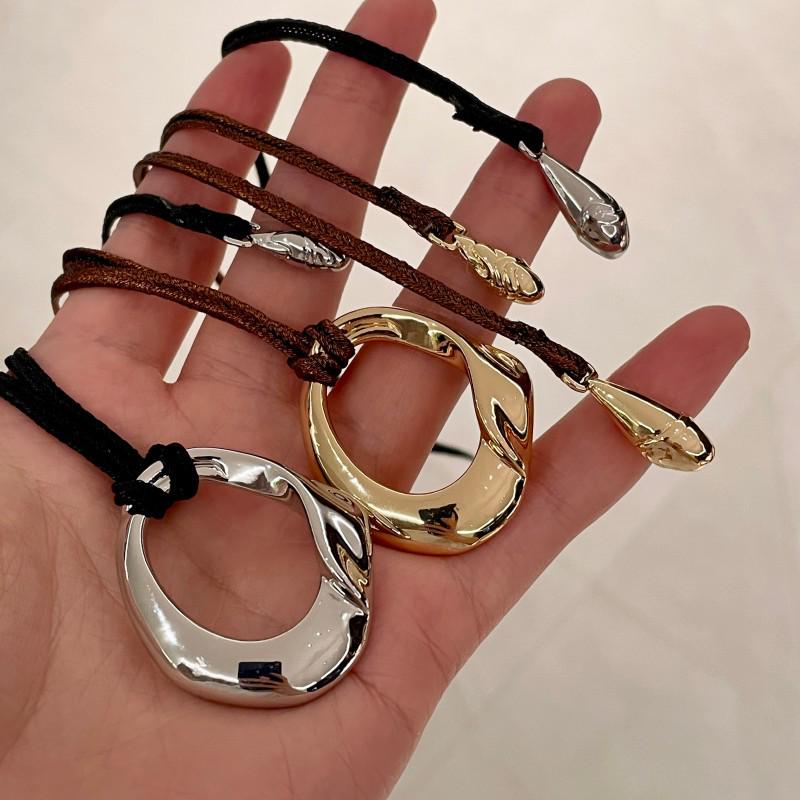 Женское черное ожерелье с подвеской из веревки - Металлический круг Дун Цзе, Длинная цепочка для свитера, Винтажный роскошный стиль