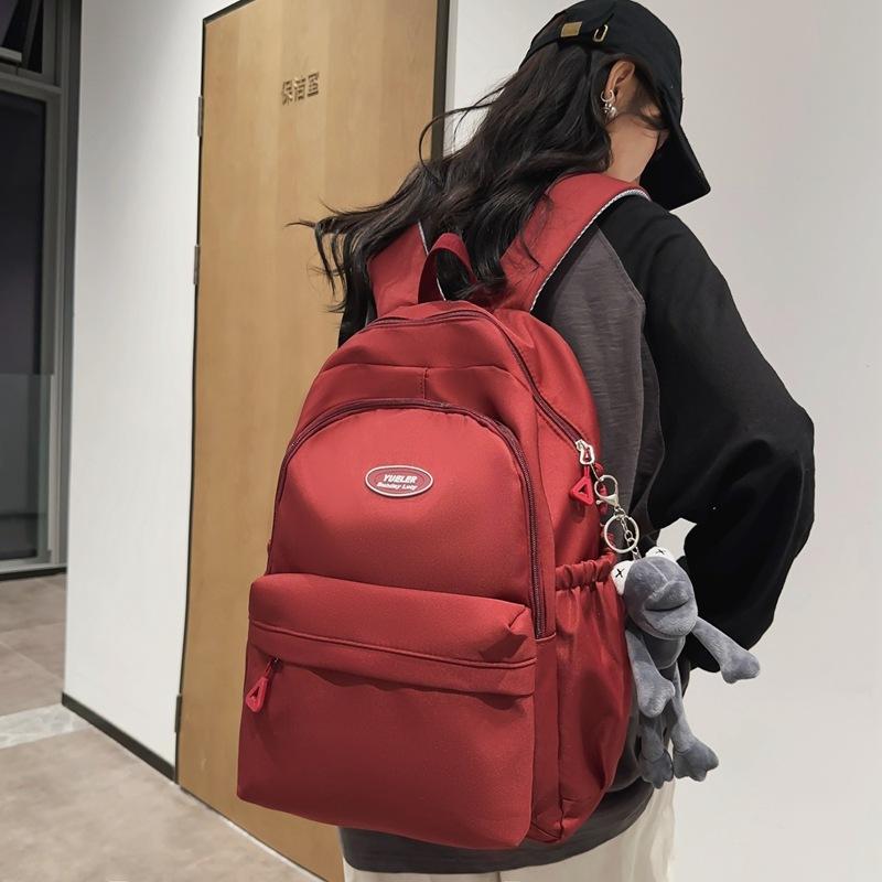 Schoolbag New Large Capacity Backpack Male and Female College Students Campus School Bag Junior High School Students Travel Computer Solid Color