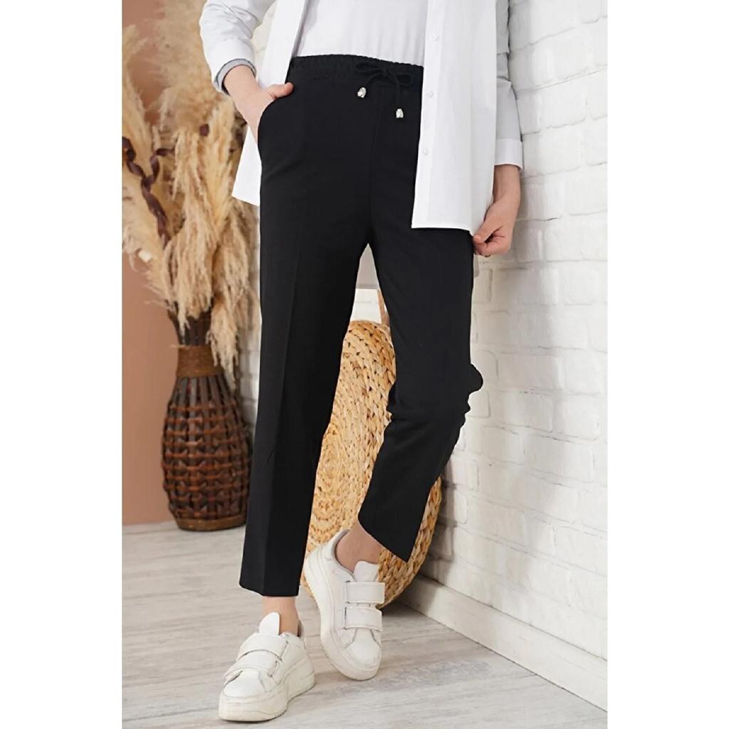 Женские эластичные брюки-морковки