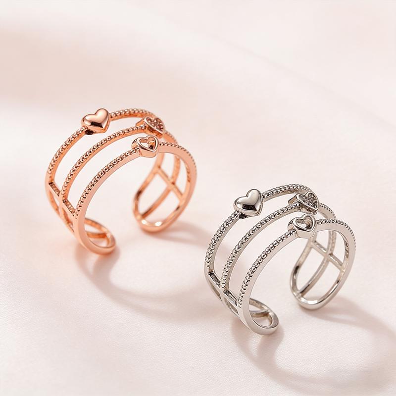 Fashionable women's simple multi-layer hollow heart personalized temperament versatile ring sweet anniversary commemorative ring