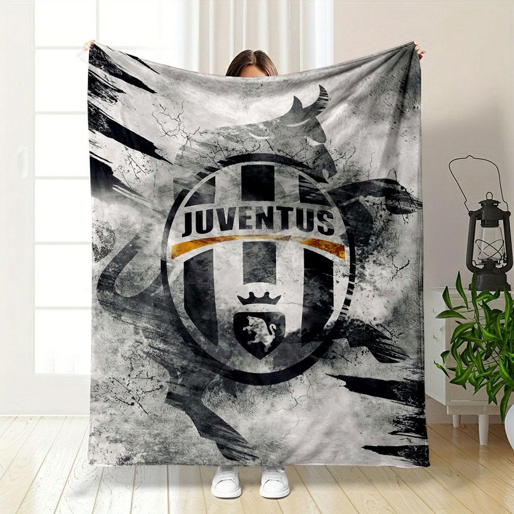 A Juventus logo with a bull silhouette on a textured, abstract background. for all seasons blanket lunch break throw gift