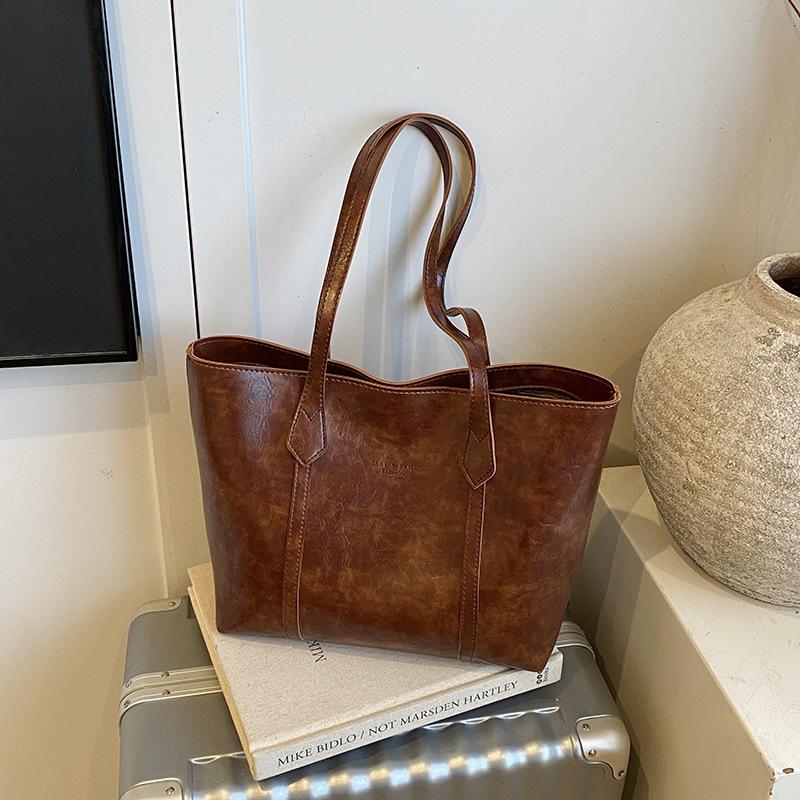 Вместительная сумка-тоут для поездок на работу, женская, новая модная модель 2025 года, осенне-зимняя, универсальная, с высоким чувством стиля, для выхода в свет, на плечо