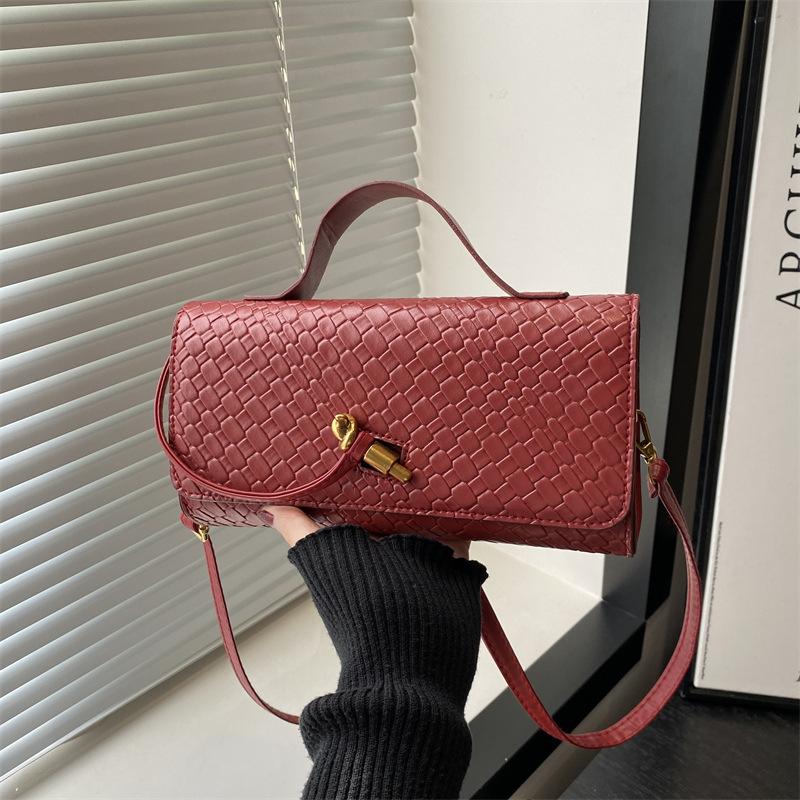 Spring and Summer New Woven Soft Leather Dinner Bag Medieval Baguette Bag Organ Bag Horizontal Portable Messenger Bag Women