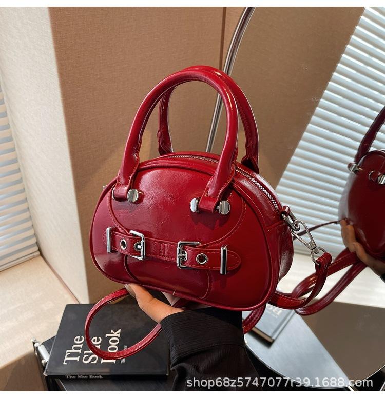 2025 spring new simple hand-held fashionable shell bag women's shoulder bag Korean version of underarm bag casual women's bag