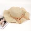 Straw hat female summer waves along big bow sunshade sunscreen travel beach hat Korean version holiday face covering sun hat