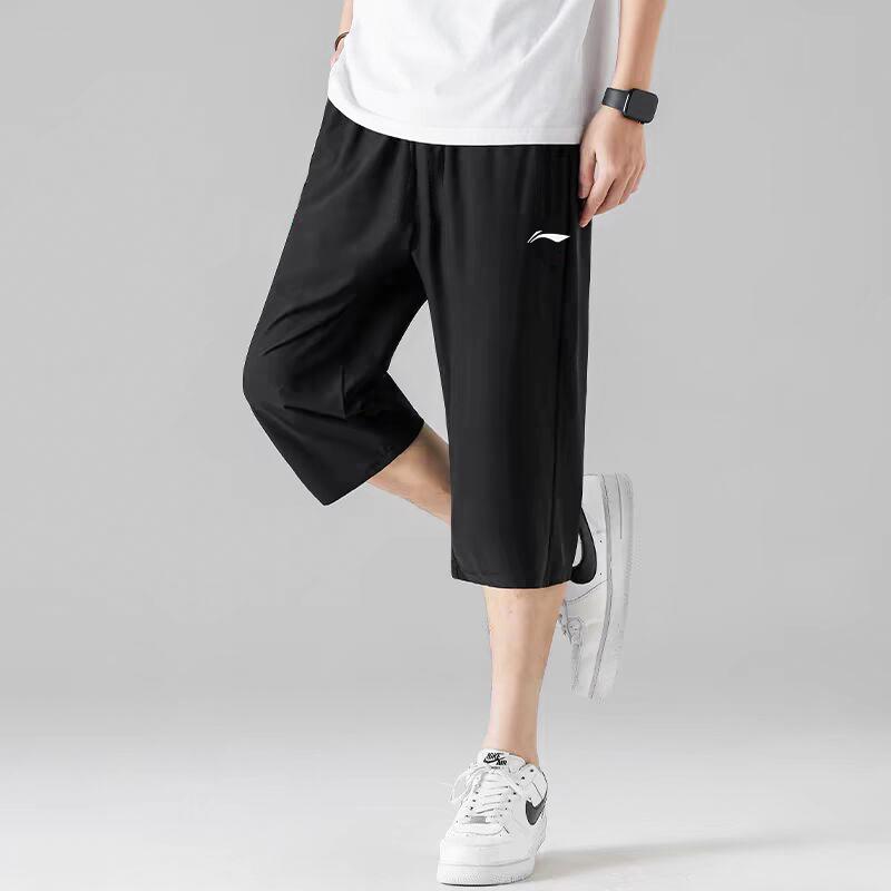 Штаны мужские Li Ning однотонные, средней талии, удобные, универсальные, дышащие, с семью точками, трикотажные, черные AKQU419-4