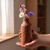 A stylish, blurred brown vase for flowers