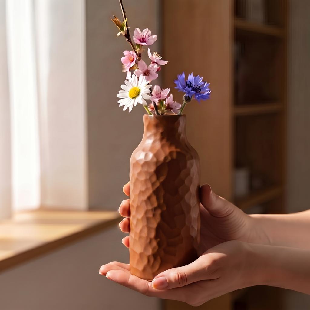 A stylish, blurred brown vase for flowers