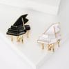 Personalized and Environmentally Friendly Alloy Clothing Accessories Small Piano Brooch Diamond Studded Instrument Chest Flower Pin
