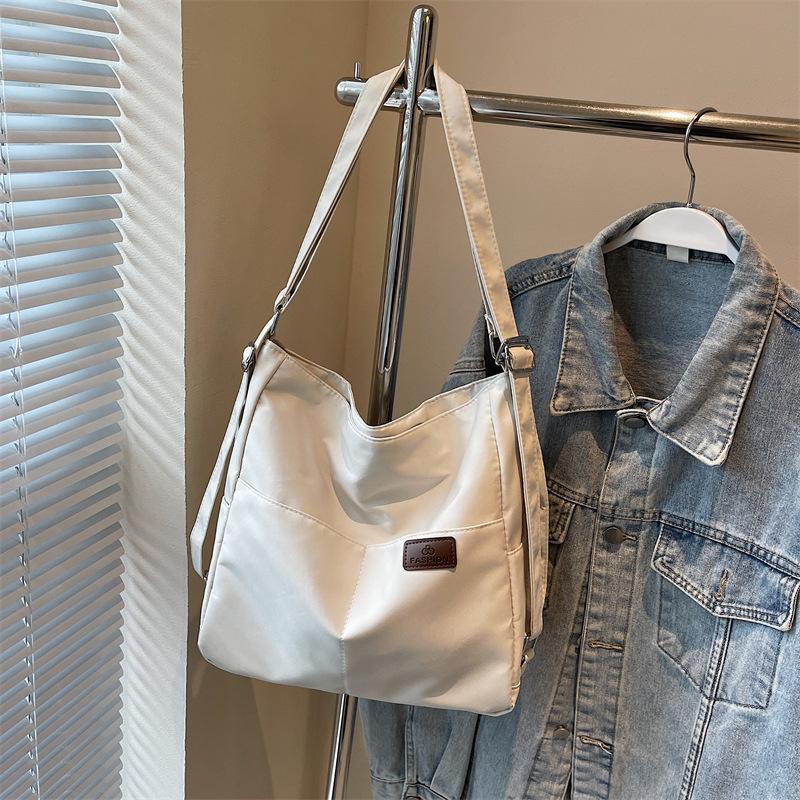 Повседневный наплечный рюкзак из ткани, текстурная сумка большой вместимости, женская новая парусиновая осенне-зимняя сумка-тоут для поездок на работу 2025