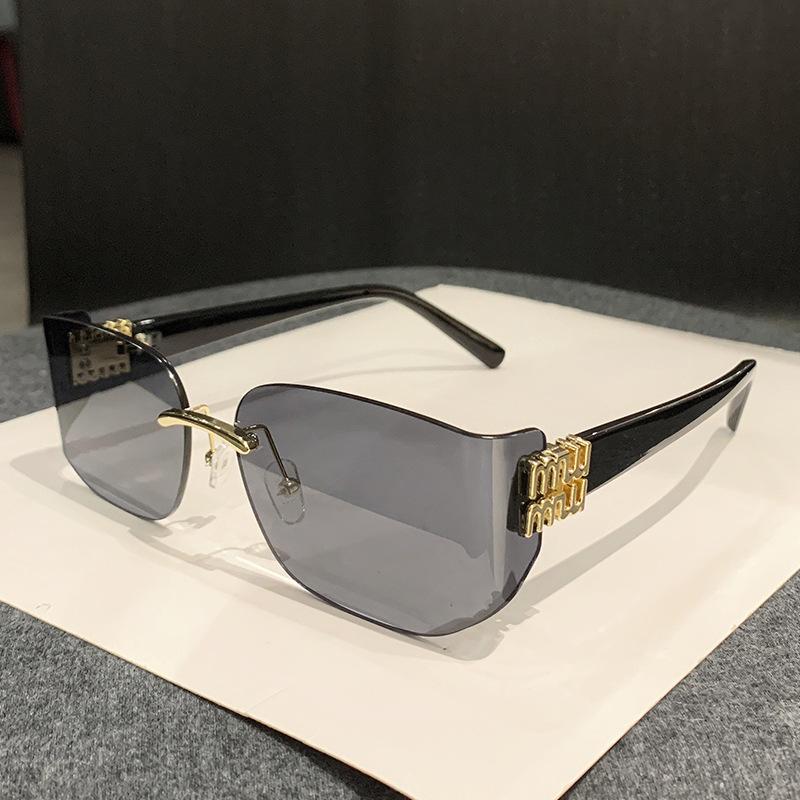 Zhang Yuanying's new frameless curved sunglasses women's yk light luxury fashion brown high-end sunglasses