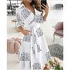 Spring Summer Fashion Long Sleeved V-neck Printed Bag Hip Dress for Women