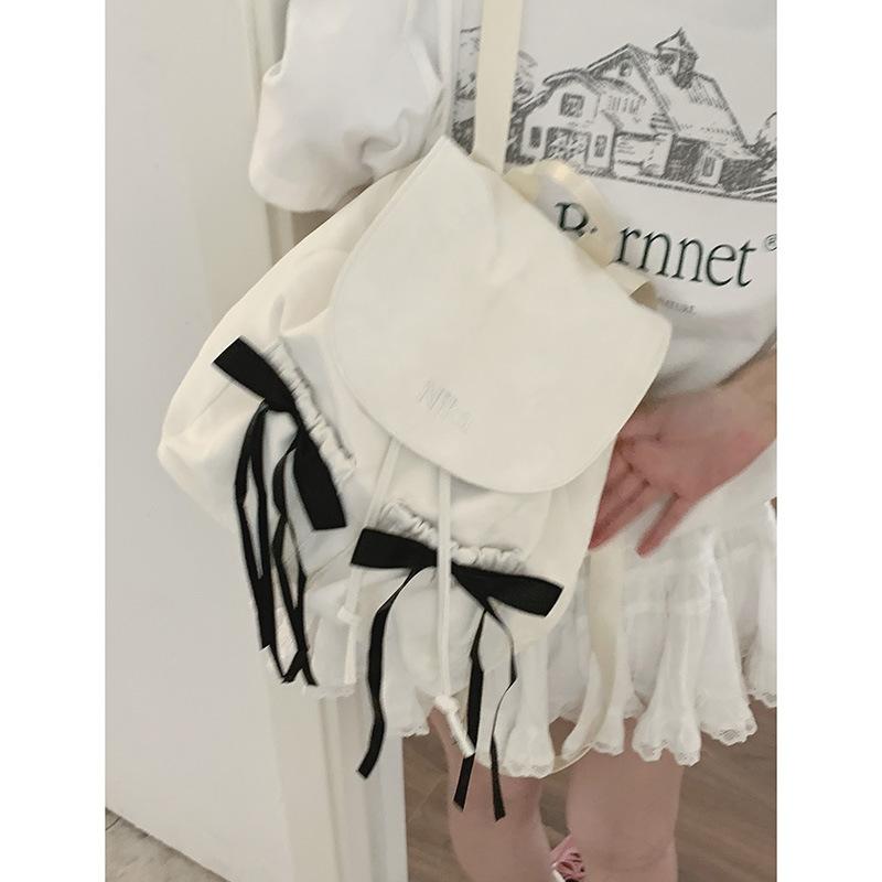 Повседневный рюкзак с бантом из нейлоновой парусины, женская сумка, новый нишевый рюкзак 2025, простая дорожная сумка