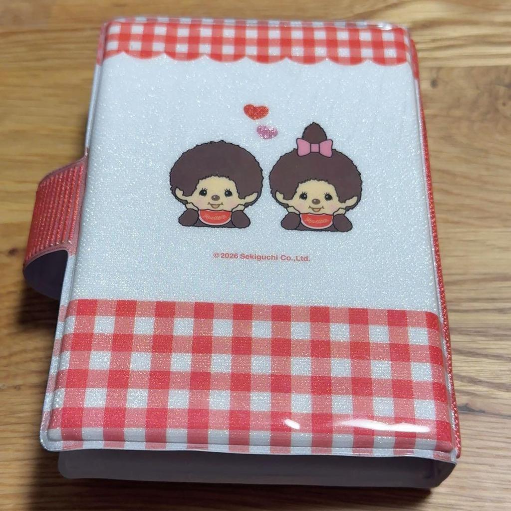 Used Monchhichi 6 hole binder sticker book