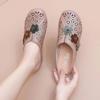 Spring and Summer New Women's Shoes Rubber Soft Sole Soft Leather Flat Bottom Bag Head Flower Mother Shoes Breathable Hole Beach