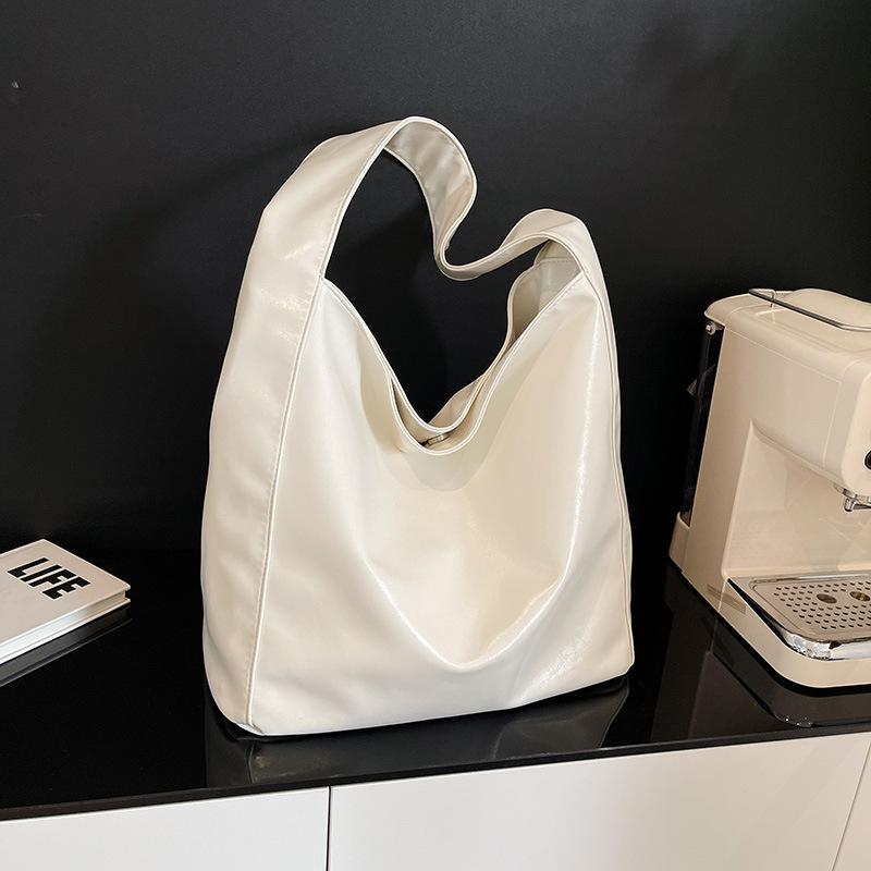 Премиальный сенс простая большая вместительная сумка-тоут женская новая повседневная ленивая стиль сумка-мессенджер для通勤