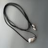 MD Asymmetrical Pear-Shaped Necklace with Versatile Faux Leather Cord, Minimalist Design, Extra-Long for Multiple Wearing Styles.