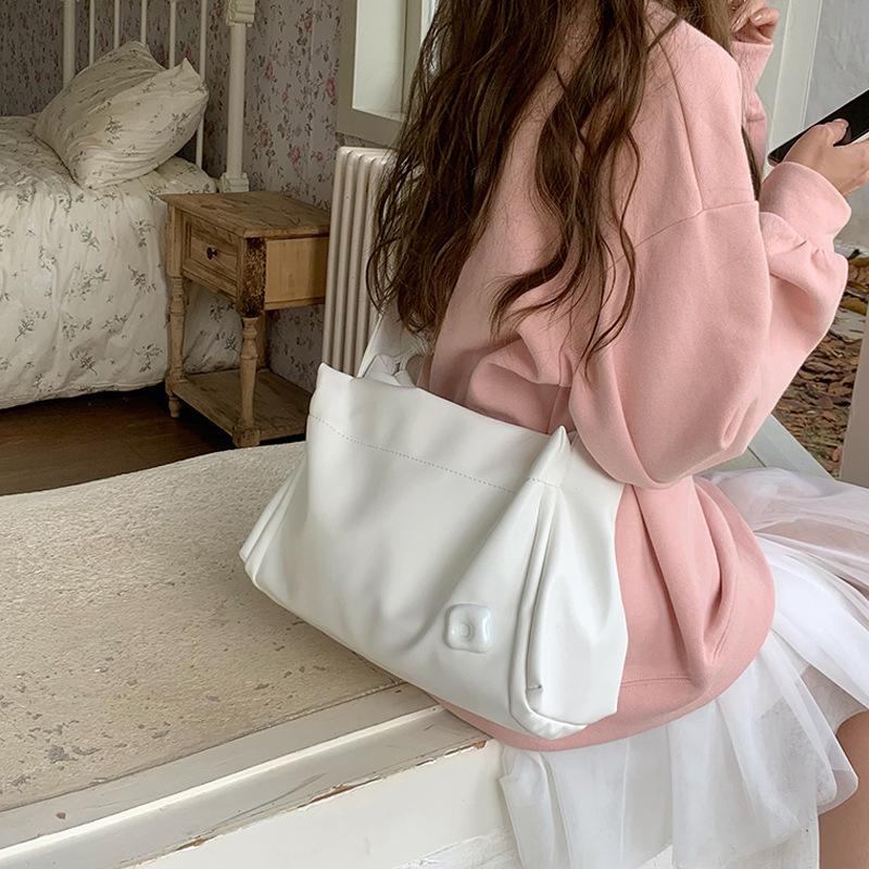 Вместительная розовая студенческая сумка для повседневной носки, сумка-игрушка для поездок на работу, новая текстурированная сумка через плечо для женщин