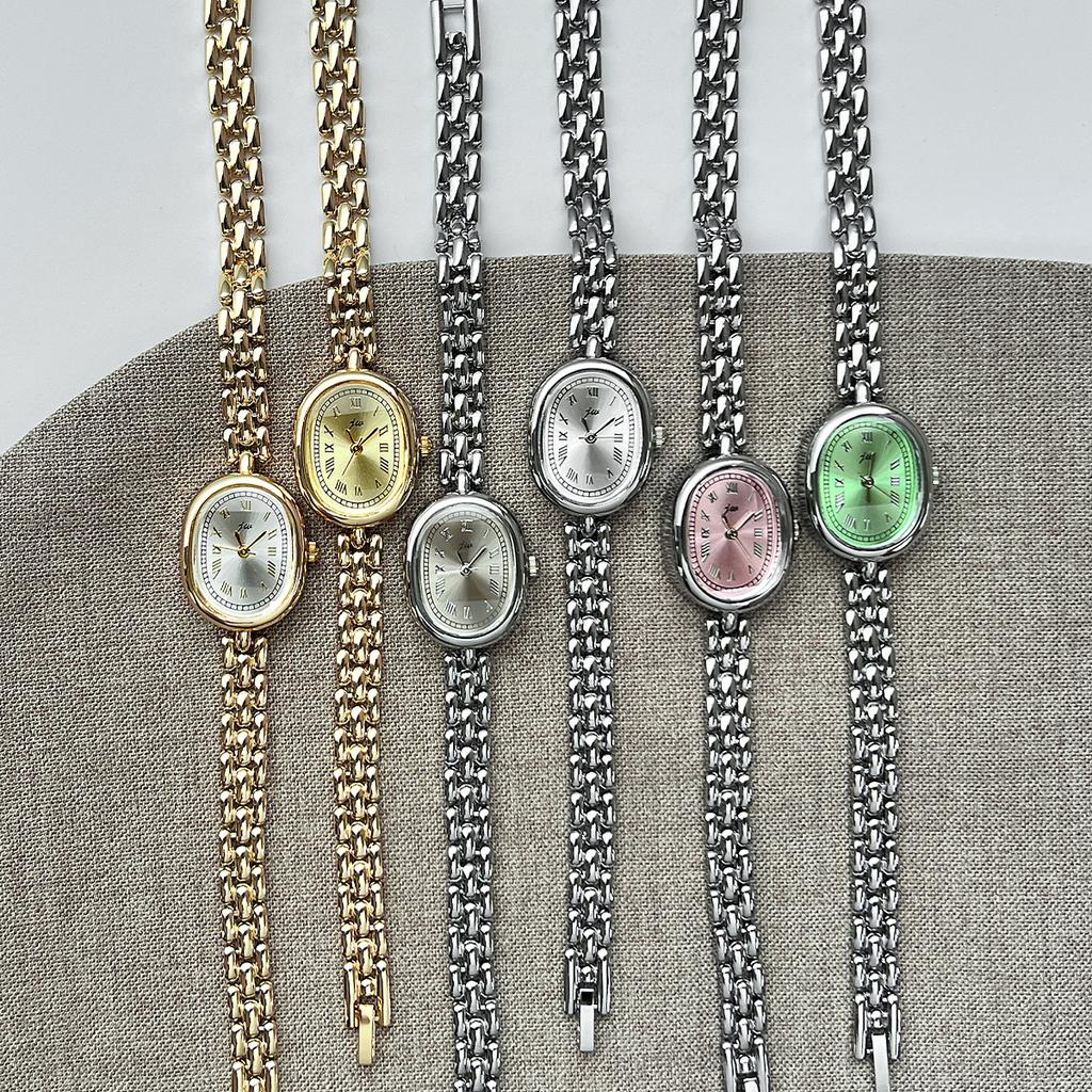 Authentic Jingwei Oval Vintage Women's Quartz Watch with Retro Roman Alloy Bracelet