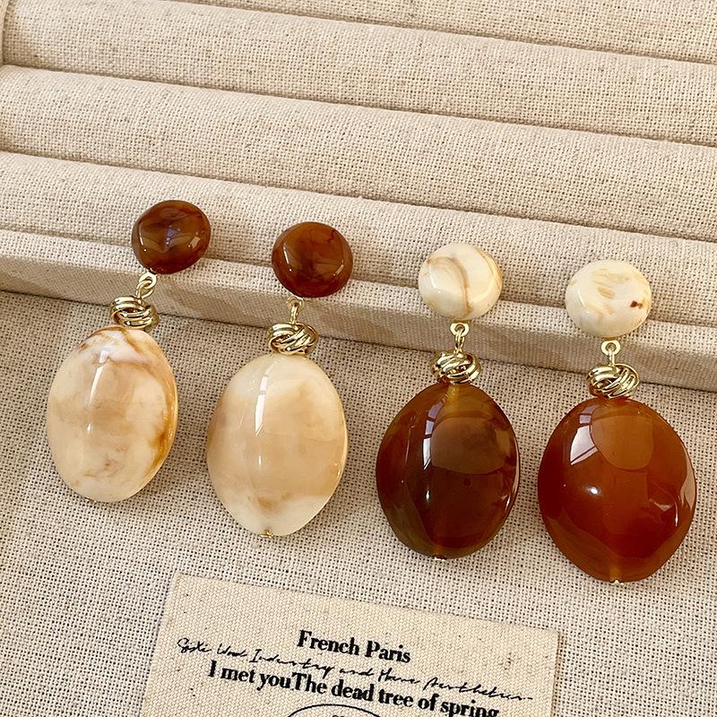 Модные серьги-подвески для женщин