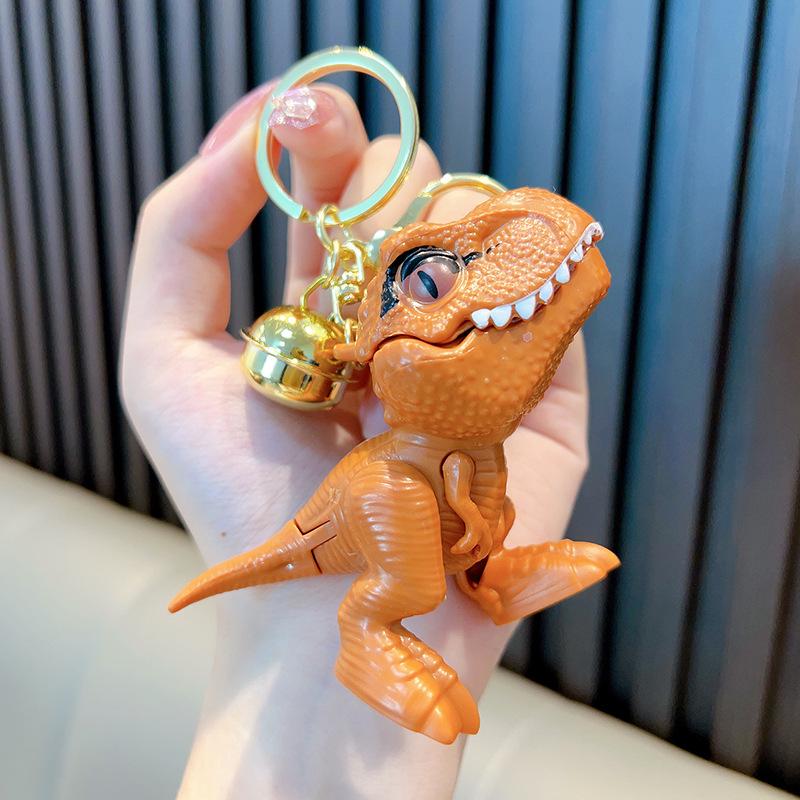 Креативный брелок в виде динозавра: Модная подвеска-игрушка в виде тираннозавра для укусов рукой для сумок, пар и подарков.