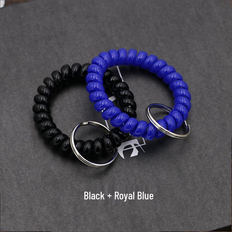 Минималистичный браслет-брелок и резинка для волос в виде пружинного механизма