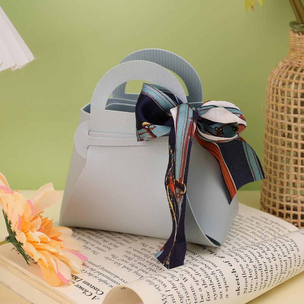 Роскошная кожаная мини-сумочка с бантом и лентой Подарочные пакеты Упаковочная коробка для конфет Распределительная сумка Свадебная вечеринка Подарочная коробка для конфет Кошелек