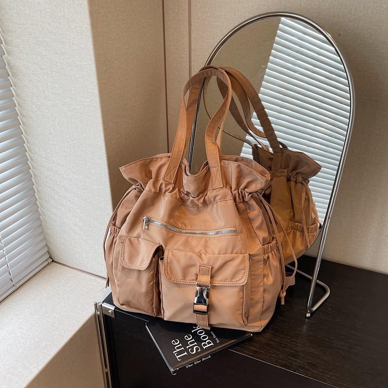 Simple Nylon Bag For Women With Soft Structure And Multiple Compartments For Everyday Carry