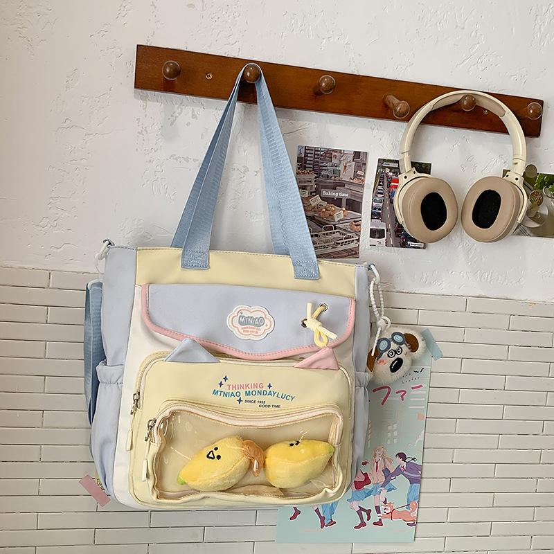 Школьный рюкзак 2025 новый ins милый высокоценный большой вместимости косметичка универсальный повседневный легкий милая сумка через плечо