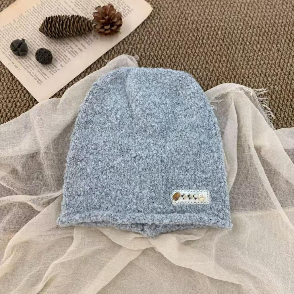 Autumn and winter versatile fashionable knitted hat warm fashion stacking hat ins premium wool hat ear protection tide